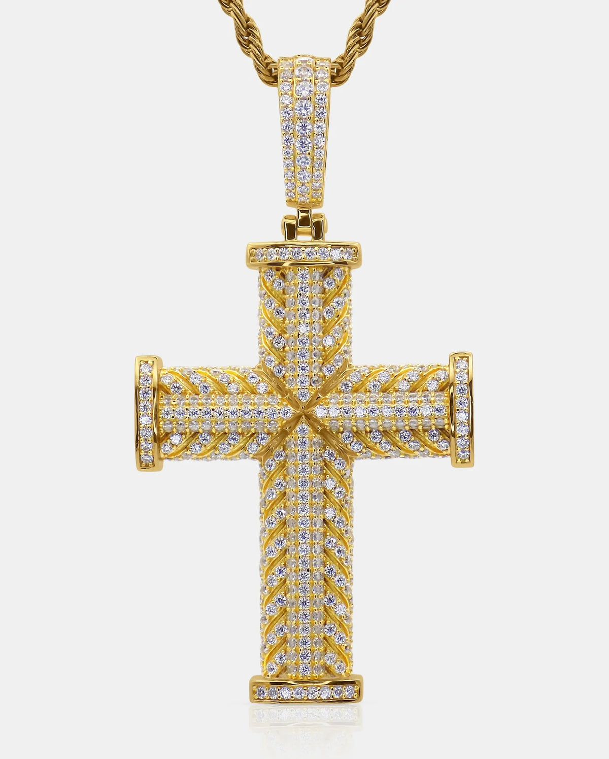 Front view of the ĀXŌN 18K gold-plated 925 silver cross pendant with pavé moissanite stones on a twisted chain — AETHER