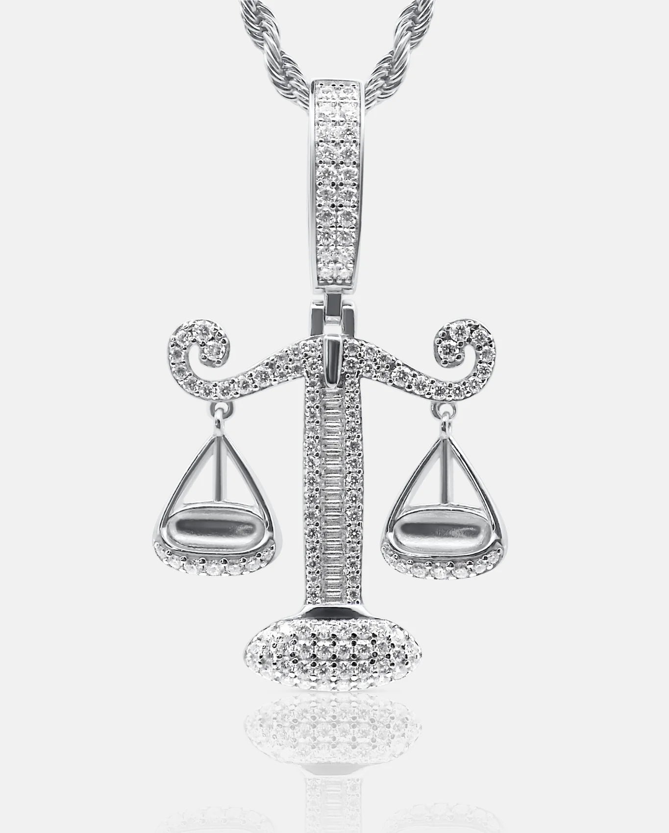 Front view of the ISOZYGÓS 925 silver balance-scale pendant with brilliant and baguette-cut VVS moissanite stones on a twisted chain — AETHER