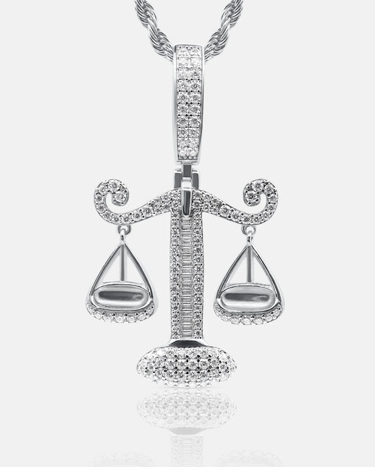 Front view of the ISOZYGÓS 925 silver balance-scale pendant with brilliant and baguette-cut VVS moissanite stones on a twisted chain — AETHER
