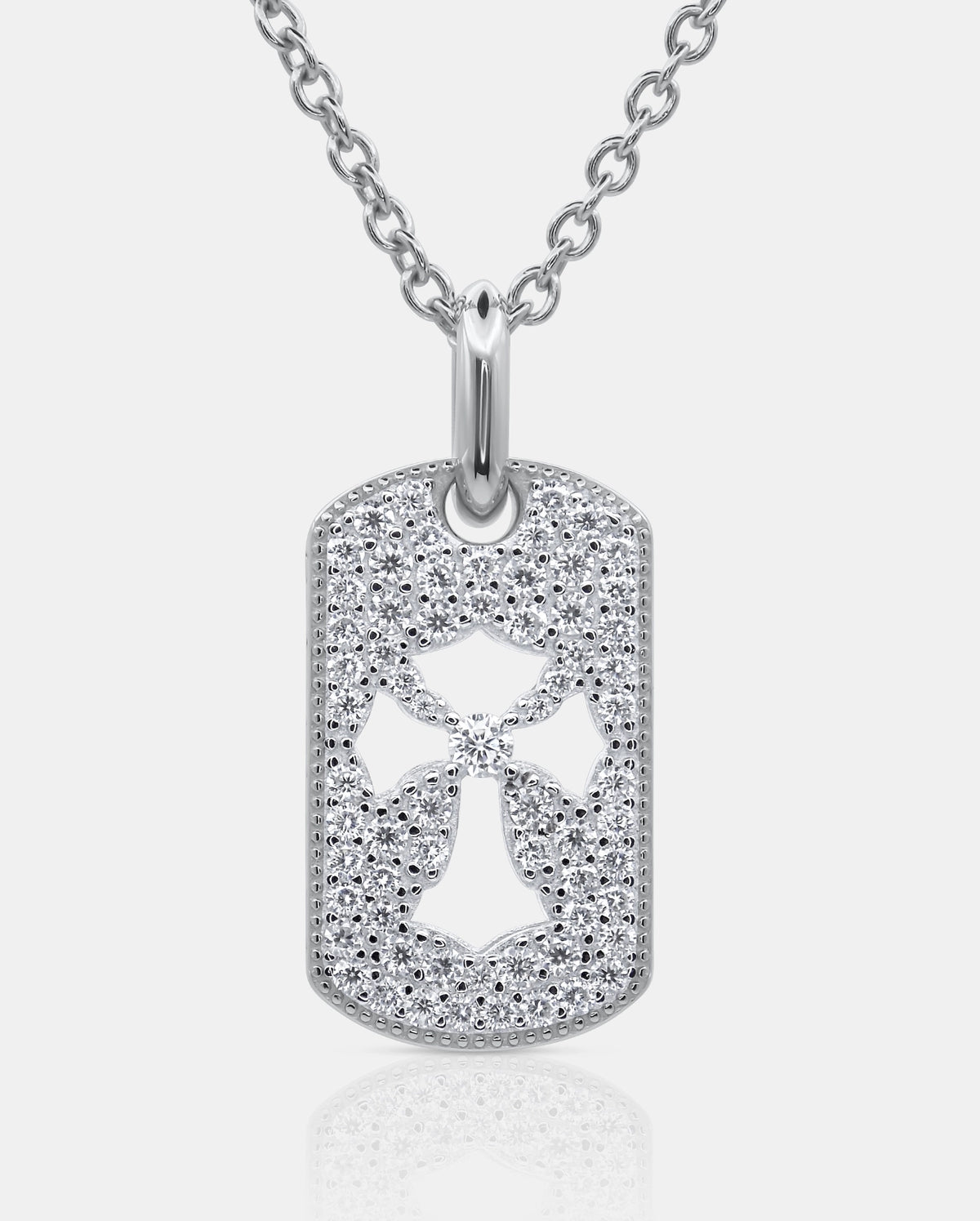 Front view of the PHYLÁKTÓN 925 silver tag pendant with pavé moissanite stones and a central cross cutout on a silver chain — AETHER