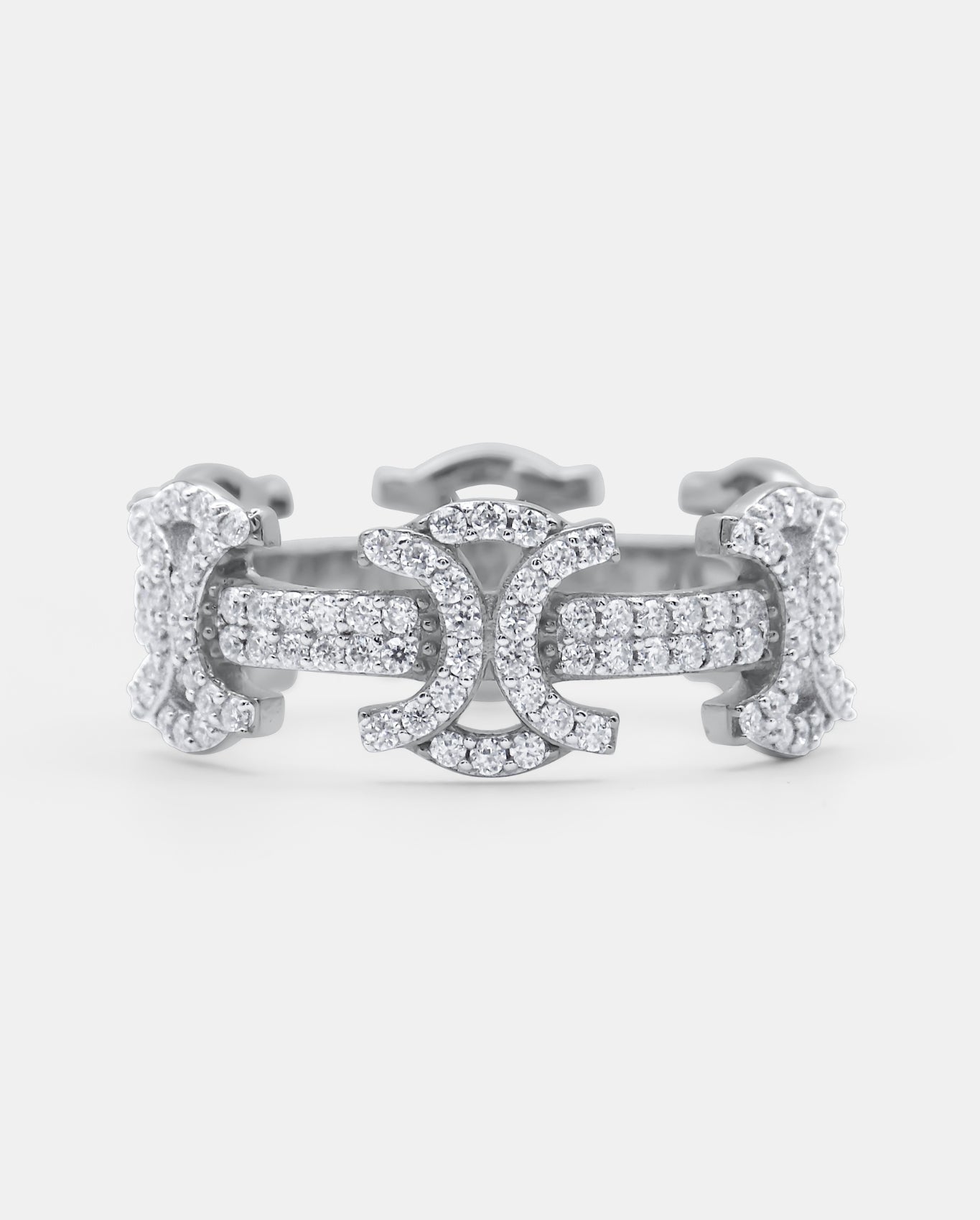 Front view of the SYMMETRIA 925 silver ring with pavé VVS moissanite stones and repeating geometric motifs — AETHER
