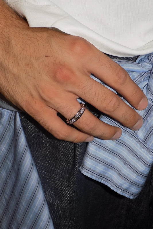 SÝZEVXIS 925 silver ring with moissanite stones and gold-tone cross motifs worn on a hand — AETHER
